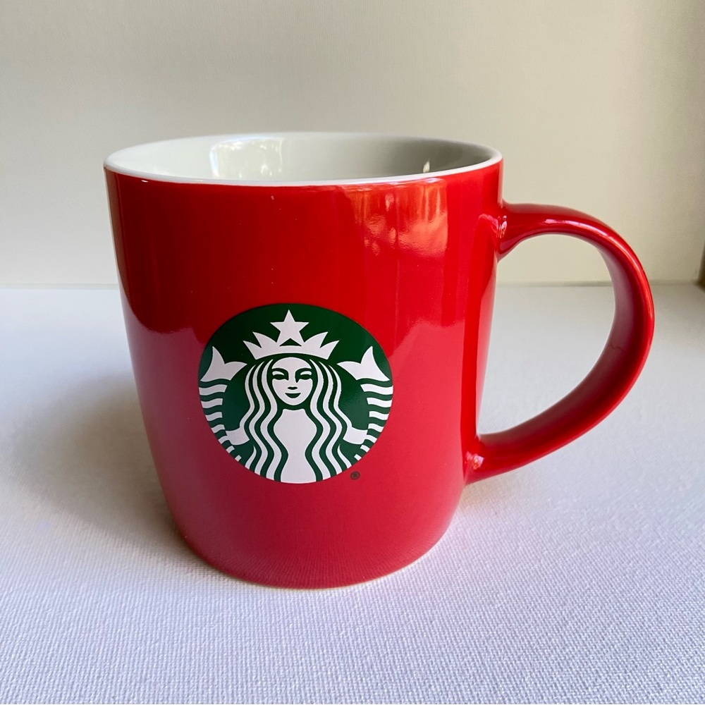 2021 Starbucks coffee tea mug with red exterior cream interior green logo 11 oz